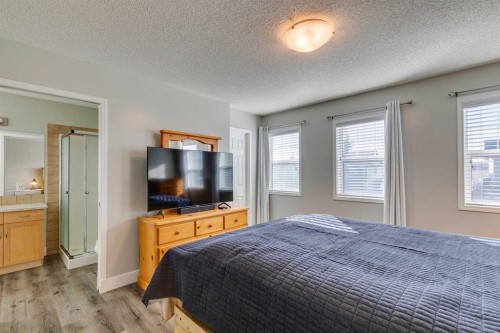 199 Everglen Way Sw, Calgary, AB - Indoor Photo Showing Bedroom