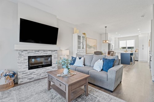 5 Larkspur Bend, Okotoks, AB - Indoor Photo Showing Living Room With Fireplace