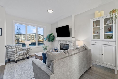 5 Larkspur Bend, Okotoks, AB - Indoor Photo Showing Living Room With Fireplace