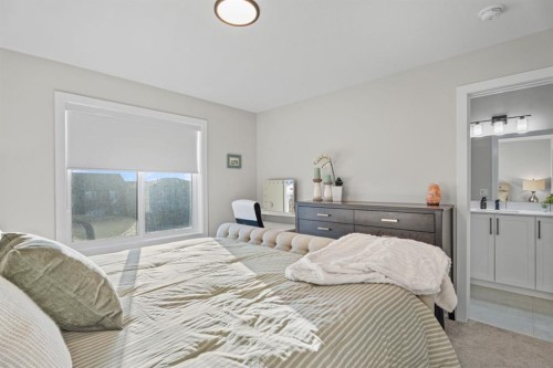 5 Larkspur Bend, Okotoks, AB - Indoor Photo Showing Bedroom