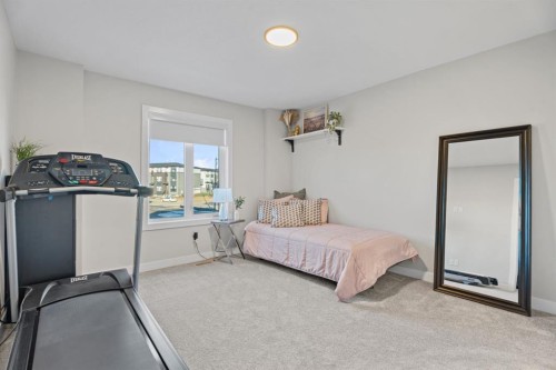 5 Larkspur Bend, Okotoks, AB - Indoor Photo Showing Bedroom