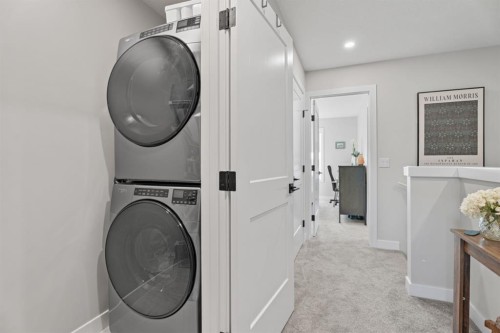 5 Larkspur Bend, Okotoks, AB - Indoor Photo Showing Laundry Room