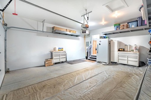 5 Larkspur Bend, Okotoks, AB - Indoor Photo Showing Garage