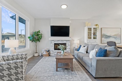 5 Larkspur Bend, Okotoks, AB - Indoor Photo Showing Living Room With Fireplace