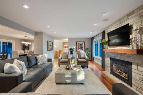 324 Willow Ridge Place Se, Calgary, AB - Indoor Photo Showing Living Room With Fireplace