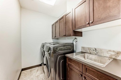 2213 27 Street Sw, Calgary, AB - Indoor Photo Showing Laundry Room