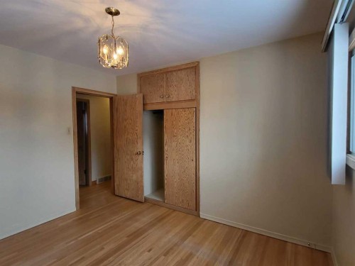 22 Montrose Crescent Ne, Calgary, AB - Indoor Photo Showing Other Room