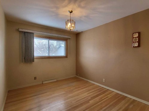 22 Montrose Crescent Ne, Calgary, AB - Indoor Photo Showing Other Room