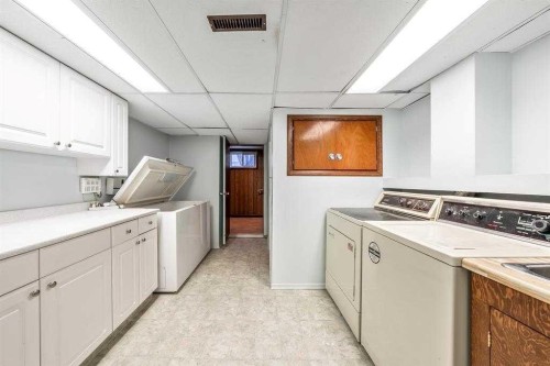 22 Montrose Crescent Ne, Calgary, AB - Indoor Photo Showing Laundry Room
