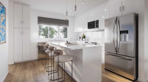 2085 Vantage Way Sw, Airdrie, AB - Indoor Photo Showing Kitchen With Stainless Steel Kitchen With Upgraded Kitchen