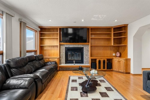 107 Pasadena Green Ne, Calgary, AB - Indoor Photo Showing Living Room With Fireplace