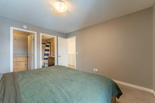 74 Evansridge Crescent Nw, Calgary, AB - Indoor Photo Showing Bedroom