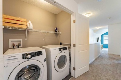 74 Evansridge Crescent Nw, Calgary, AB - Indoor Photo Showing Laundry Room