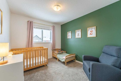74 Evansridge Crescent Nw, Calgary, AB - Indoor Photo Showing Bedroom