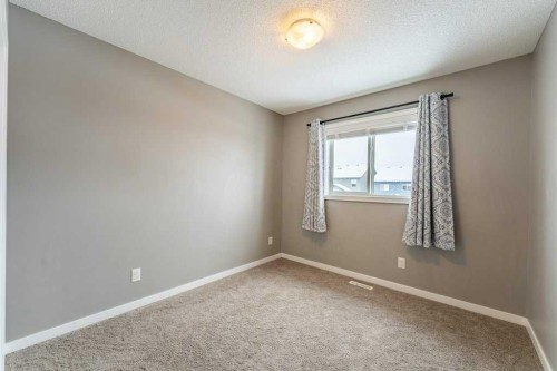 74 Evansridge Crescent Nw, Calgary, AB - Indoor Photo Showing Other Room