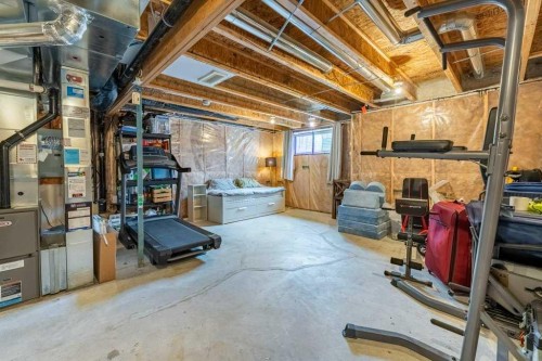 74 Evansridge Crescent Nw, Calgary, AB - Indoor Photo Showing Basement