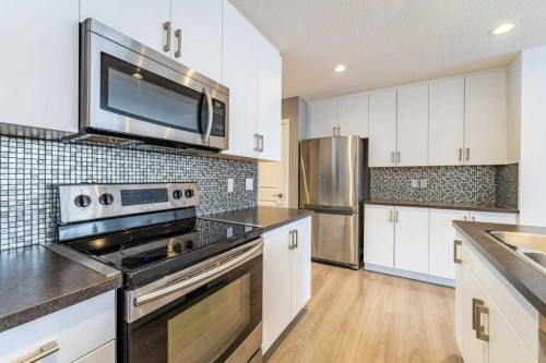74 Evansridge Crescent Nw, Calgary, AB - Indoor Photo Showing Kitchen With Stainless Steel Kitchen With Upgraded Kitchen