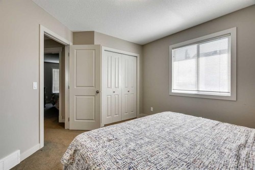 95 Evansdale Common Nw, Calgary, AB - Indoor Photo Showing Bedroom