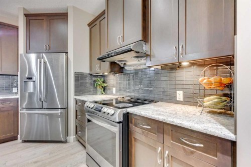 95 Evansdale Common Nw, Calgary, AB - Indoor Photo Showing Kitchen With Stainless Steel Kitchen With Upgraded Kitchen