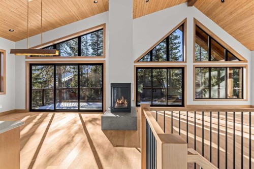 28 Blue Grouse Ridge, Canmore, AB - Indoor Photo Showing Other Room With Fireplace