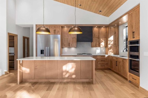 28 Blue Grouse Ridge, Canmore, AB - Indoor Photo Showing Kitchen With Upgraded Kitchen