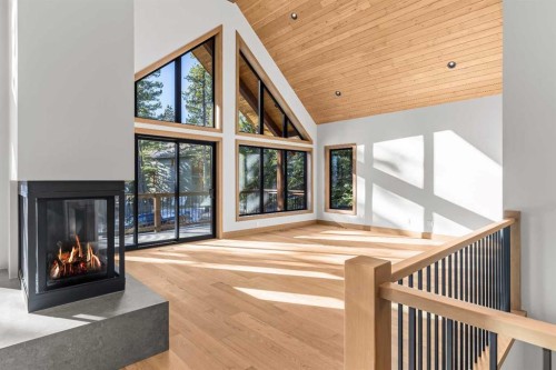 28 Blue Grouse Ridge, Canmore, AB - Indoor Photo Showing Other Room With Fireplace