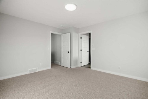63 Creekstone Common Sw, Calgary, AB - Indoor Photo Showing Other Room