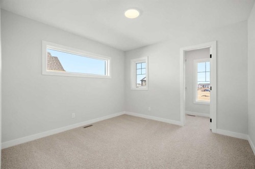 63 Creekstone Common Sw, Calgary, AB - Indoor Photo Showing Other Room