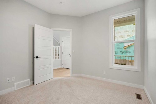 63 Creekstone Common Sw, Calgary, AB - Indoor Photo Showing Other Room
