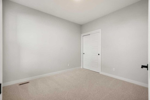 63 Creekstone Common Sw, Calgary, AB - Indoor Photo Showing Other Room