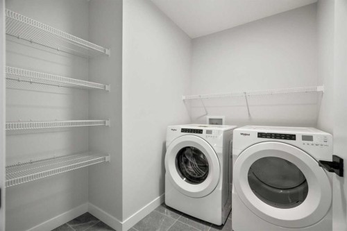 63 Creekstone Common Sw, Calgary, AB - Indoor Photo Showing Laundry Room