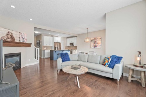 308 Chaparral Valley Way Se, Calgary, AB - Indoor Photo Showing Living Room With Fireplace