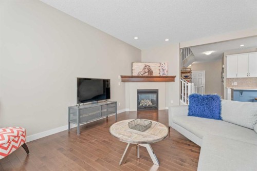 308 Chaparral Valley Way Se, Calgary, AB - Indoor Photo Showing Living Room With Fireplace
