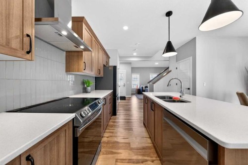 3238 Chinook Winds Drive Sw, Airdrie, AB - Indoor Photo Showing Kitchen With Double Sink With Upgraded Kitchen