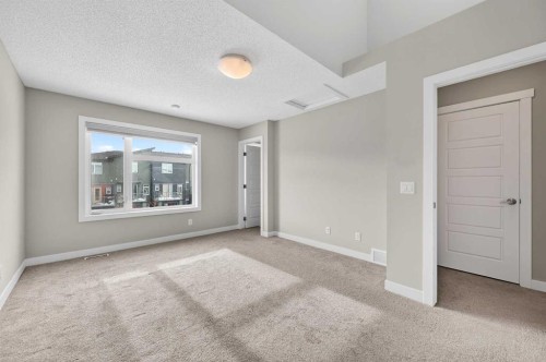 30 Sage Bluff Gate Nw, Calgary, AB - Indoor Photo Showing Other Room