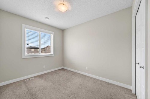 30 Sage Bluff Gate Nw, Calgary, AB - Indoor Photo Showing Other Room