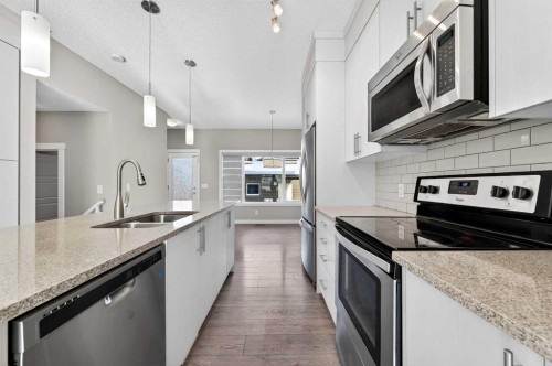 30 Sage Bluff Gate Nw, Calgary, AB - Indoor Photo Showing Kitchen With Stainless Steel Kitchen With Double Sink With Upgraded Kitchen