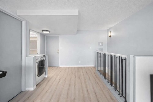 104-1817 14A Street Sw, Calgary, AB - Indoor Photo Showing Laundry Room