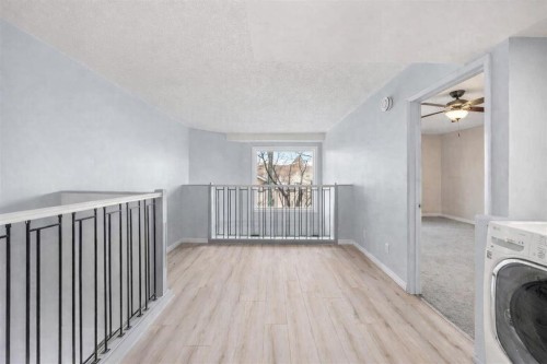 104-1817 14A Street Sw, Calgary, AB - Indoor Photo Showing Laundry Room