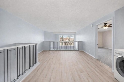 104-1817 14A Street Sw, Calgary, AB - Indoor Photo Showing Laundry Room