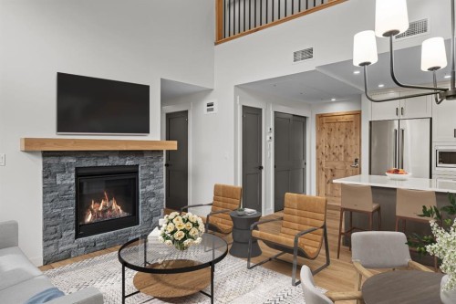 405-1505 Spring Creek Gate, Canmore, AB - Indoor Photo Showing Living Room With Fireplace