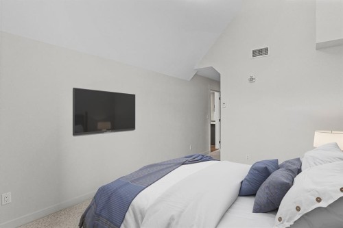 405-1505 Spring Creek Gate, Canmore, AB - Indoor Photo Showing Bedroom