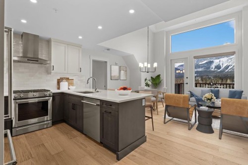 405-1505 Spring Creek Gate, Canmore, AB - Indoor Photo Showing Kitchen With Upgraded Kitchen