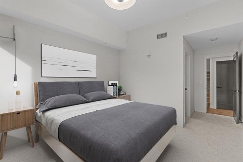 405-1505 Spring Creek Gate, Canmore, AB - Indoor Photo Showing Bedroom