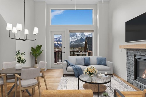 405-1505 Spring Creek Gate, Canmore, AB - Indoor Photo Showing Living Room With Fireplace