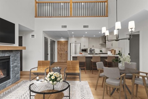 405-1505 Spring Creek Gate, Canmore, AB - Indoor With Fireplace