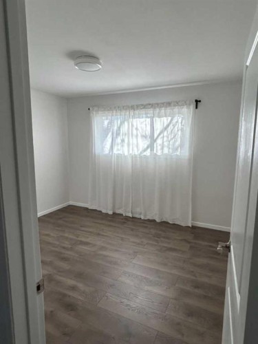 2103 Milne Drive Ne, Calgary, AB - Indoor Photo Showing Other Room