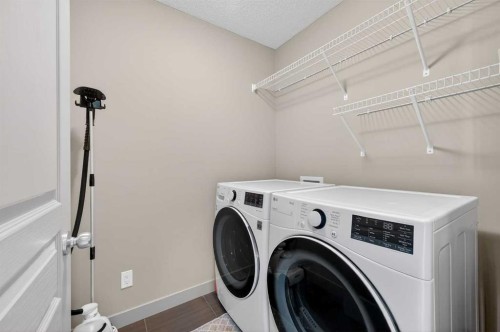253 Chaparral Valley Drive Se, Calgary, AB - Indoor Photo Showing Laundry Room