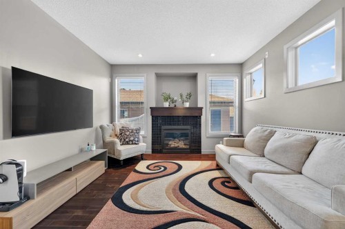 253 Chaparral Valley Drive Se, Calgary, AB - Indoor Photo Showing Living Room With Fireplace