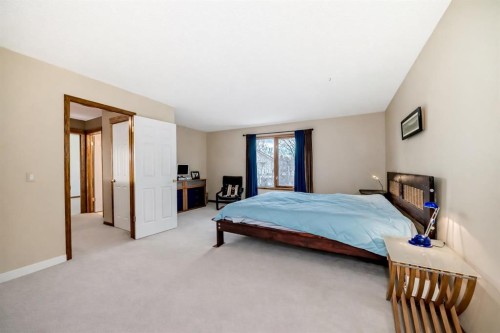 66 Tuscany Hills Point Nw, Calgary, AB - Indoor Photo Showing Bedroom